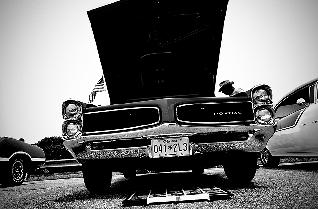  looks at a 1966 Pontiac Lemans convertible during The Chesapeake Classic 